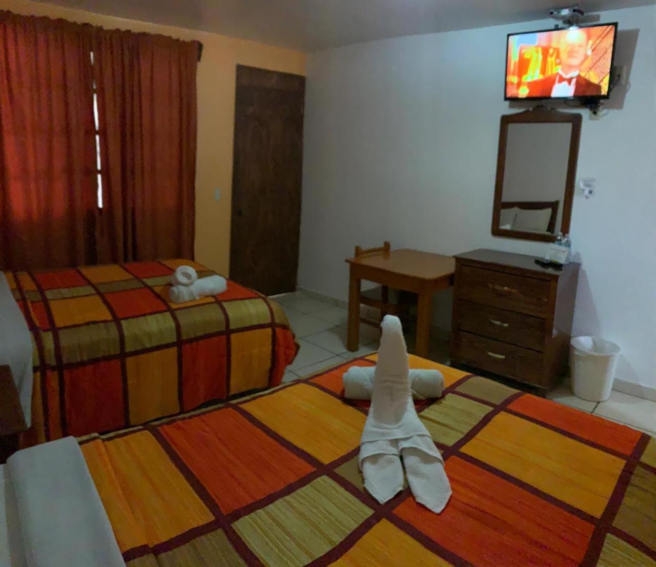 Hotel Y Cabanas Alan 치그나우아판 외부 사진